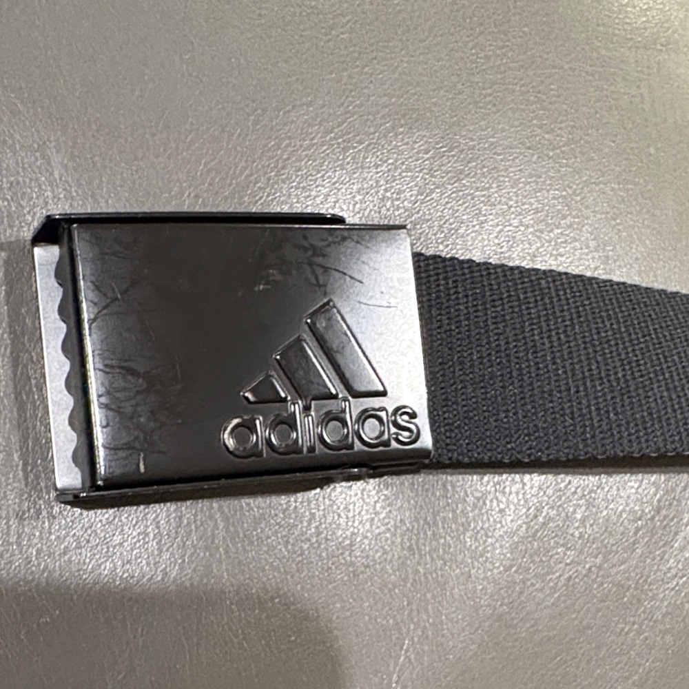 Adidas Charcoal Belt with Black Buckle. Reversible Silver.